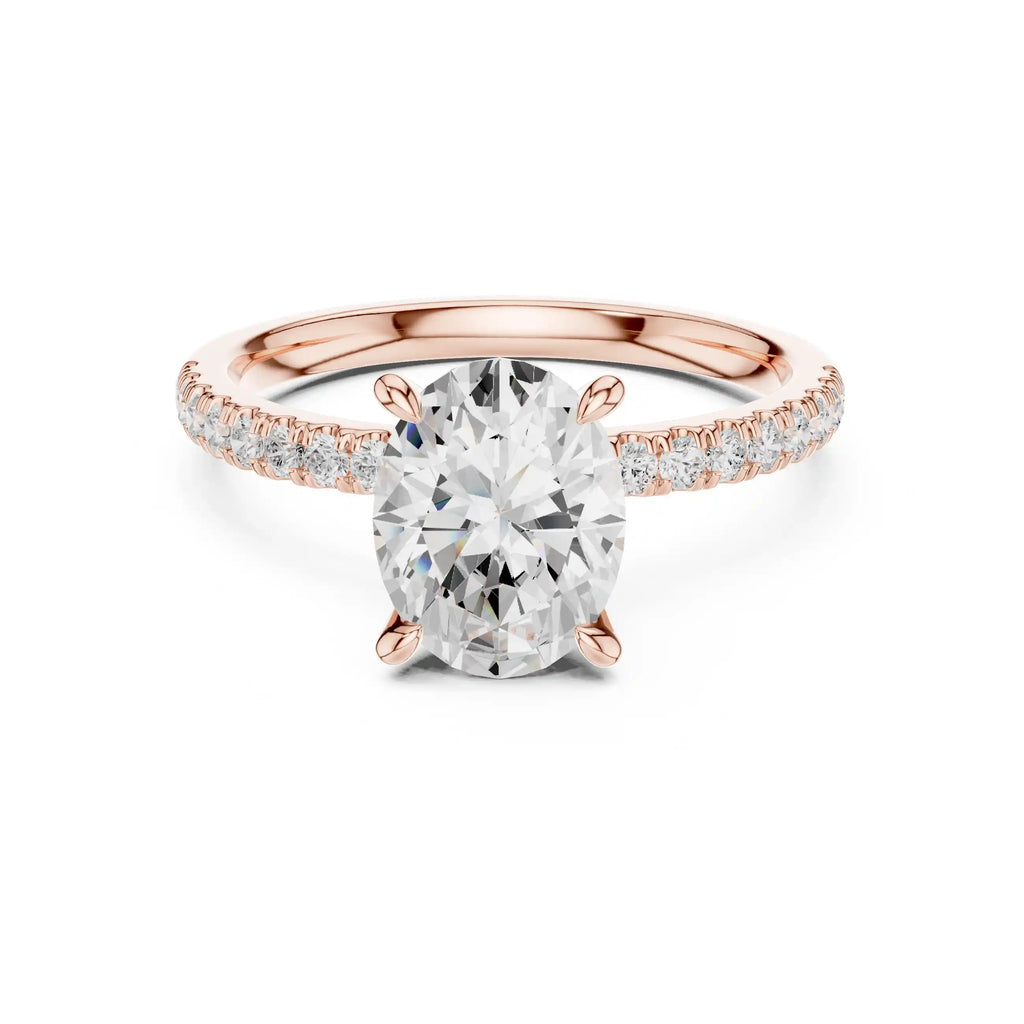 Oval-Cut Diamond Solitaire Ring with Pavé Shoulders & Hidden Marquise Accent