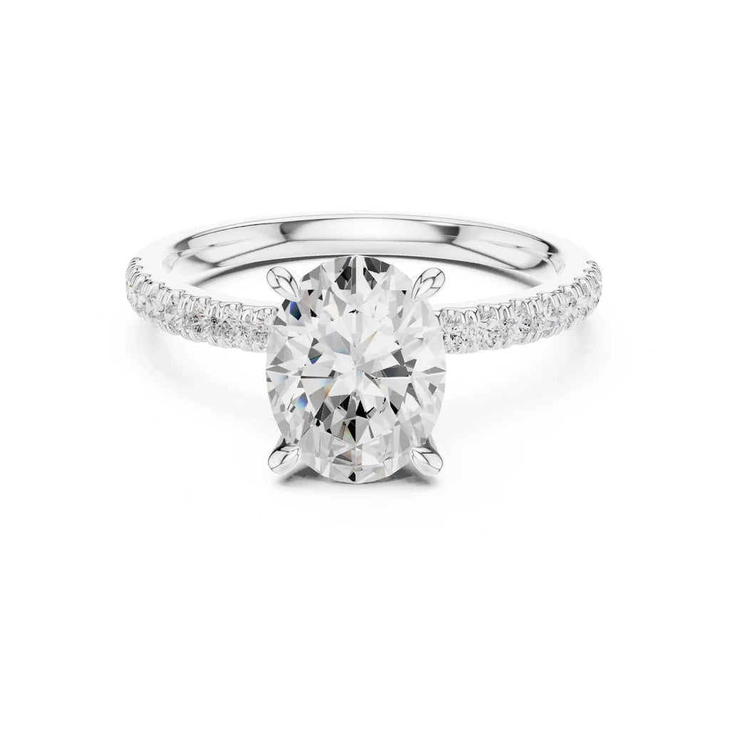 Oval-Cut Diamond Solitaire Ring with Pavé Shoulders & Hidden Marquise Accent